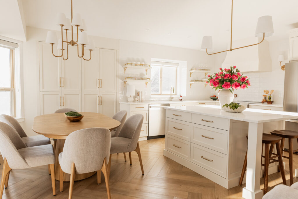 transitional cream kitchen, plaster hood, open brass shelves, tile to ceiling