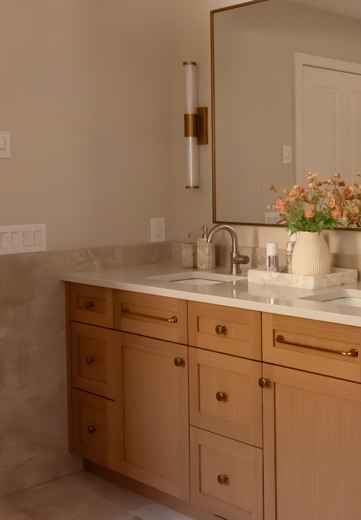 Minimizing switches in a bathroom renovation to reduce visual clutter