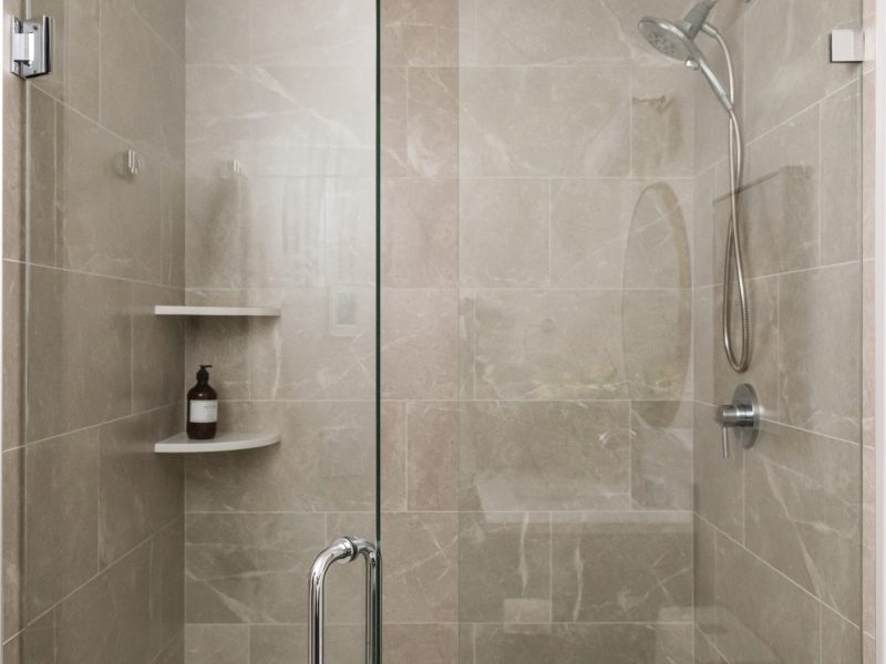 basement bathroom with walk in shower