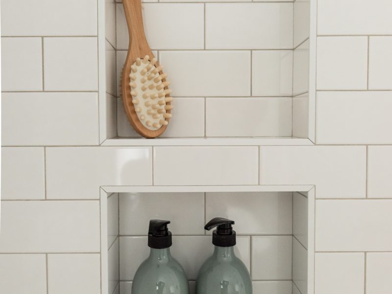 subway tile shower surround and niche