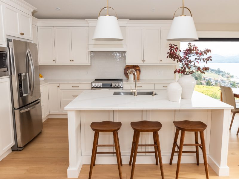 traditional simply white kitchen with wood accents