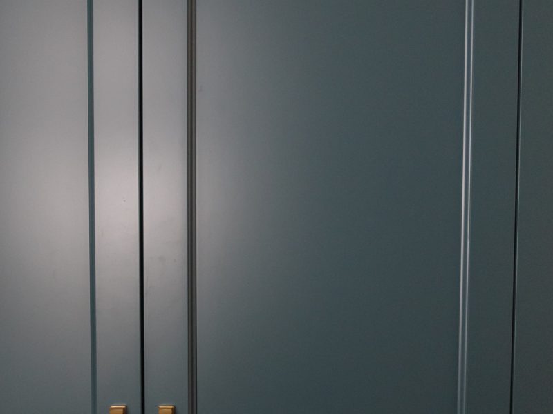 custom vent holes in cabinetry locker blue