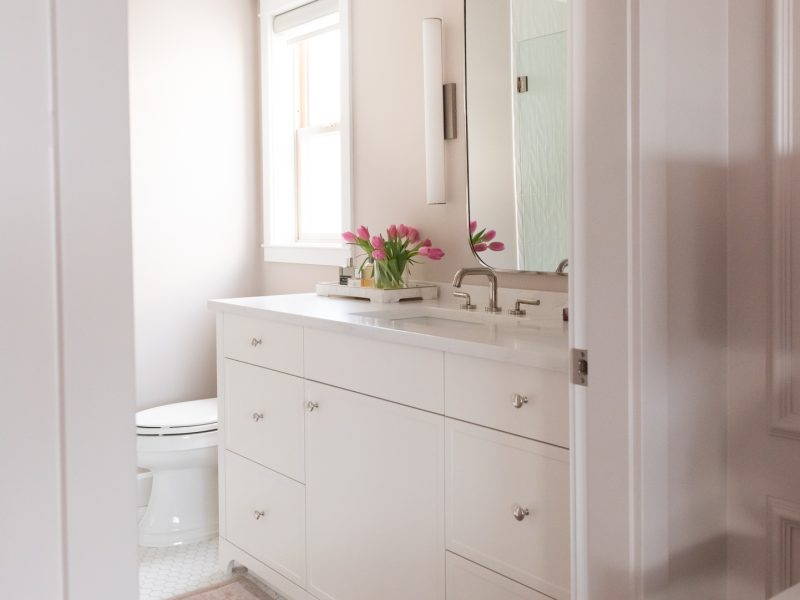 pink bathroom, white vanity