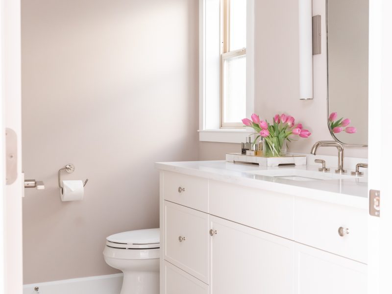 pink bathroom, white vanity