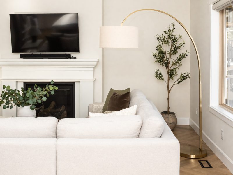 transitional living room, cast stone fireplace