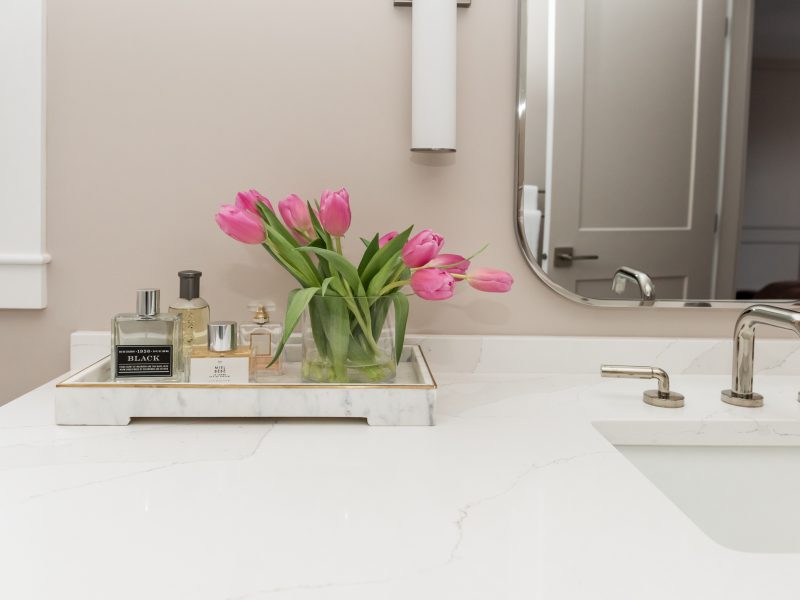 bathroom countertop styling, perfume, pink tulips